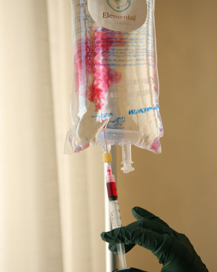 Elemental IV drip prepared for a mobile therapy session